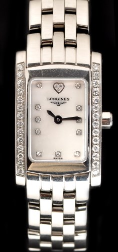 Lot 626 - Longines: a lady's stainless steel and diamond...