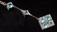 Lot 639 - An Edwardian zircon pendant, set with circular...