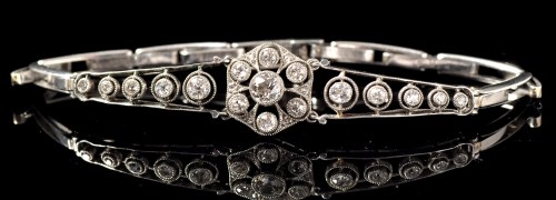 Lot 663 - An Edwardian diamond bracelet, the central...
