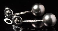 Lot 675 - A pair of Tahitian black pearl and diamond...