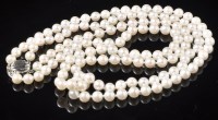 Lot 680 - A double row cultured pearl necklace, each...