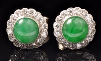 Lot 687 - A pair of early 20th Century jade and diamond...