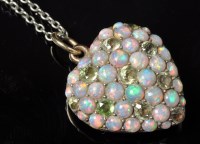 Lot 693 - An Edwardian peridot and opal heart-shaped...