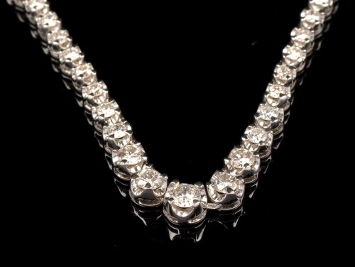 Lot 705 - A diamond necklace, the graduated...