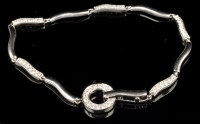 Lot 709 - A diamond bracelet, the 18ct. white gold...