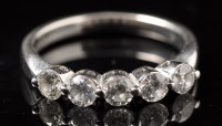 Lot 712 - A five stone diamond ring, the brilliant-cut...