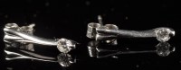 Lot 714 - A pair of diamond drop earrings, each set with...