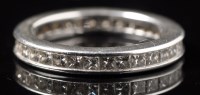 Lot 724 - A diamond eternity ring, set with...