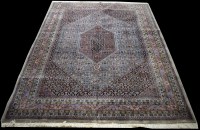 Lot 738 - A Tabriz carpet, the lozenge shaped fields...