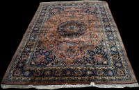 Lot 742 - A Kashan carpet, the blue floral decoration on...