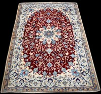 Lot 745 - A Nain rug, the central medallion surrounded...