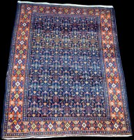 Lot 748 - A Senneh rug, with flowerhead motifs on a blue...