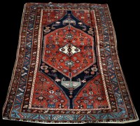 Lot 755 - A Malayer rug, decorated with flowerheads and...