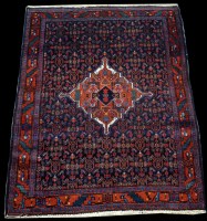 Lot 769 - A Senneh rug, with repeated flowerhead...