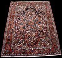 Lot 773 - A Bakhtiari rug, the scrolling central...