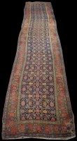 Lot 777 - A Kurdish runner, decorated throughout with...