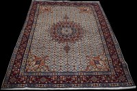 Lot 782 - A Moud carpet, the central floral rosette...