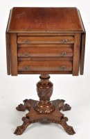 Lot 810 - A mid 19th Century drop leaf work table,...