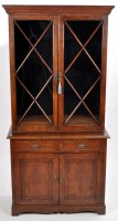 Lot 815 - A Victorian oak bookcase, the stepped cornice...