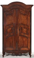 Lot 817 - A French 19th Century fruitwood armoire, with...