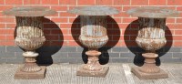 Lot 831 - A set of three early 20th Century cast iron...