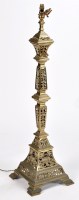Lot 832 - An ornate pierced brass standard lamp, the...