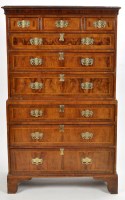 Lot 840 - An early George III walnut veneered tallboy,...