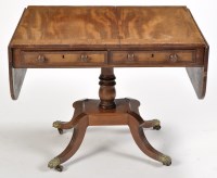 Lot 849 - A late Georgian mahogany sofa table, decorated...