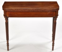 Lot 850 - A late Georgian mahogany card table, the...