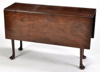 Lot 851 - A George II red walnut drop leaf table, with a...