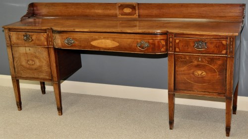 Lot 869 - A mahogany sideboard, George III and later,...
