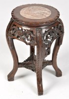 Lot 879 - A Chinese carved and pierced hardwood fish...