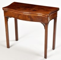 Lot 886 - A George III mahogany serpentine fronted tea...