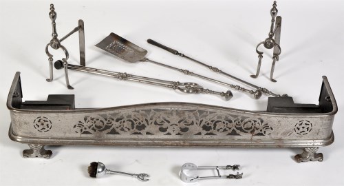 Lot 894 - A 19th Century brushed steel pierced fender,...