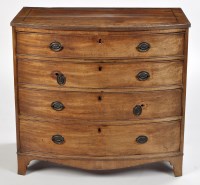 Lot 904 - A George III mahogany bowfront chest, the...