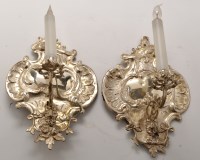 Lot 904A - A pair of Louis XV style white metal wall...