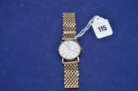 Lot 115 - A 9ct. yellow gold gentleman's wristwatch by...