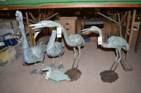 Lot 205 - Cast metal figures of storks and geese. (5)