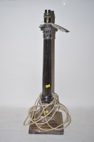 Lot 257 - A silver-plated table lamp with corinthian...