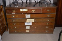 Lot 432 - An early 20th Century stained wood pine chest...