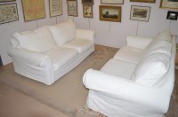 Lot 485 - Two modern three-seater settees made by Sofa...