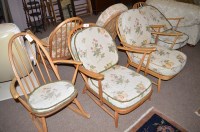 Lot 550 - Three Ercol covered seat open arm easy chairs...