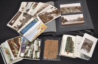 Lot 56A - An album of stocks and interest postcards and...
