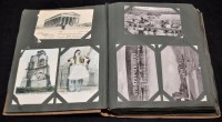 Lot 60A - A postcard album containing early 20th...