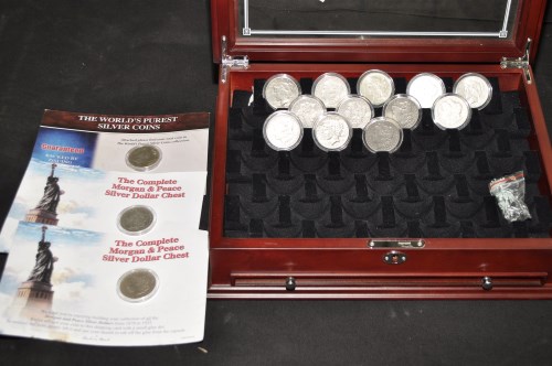 Lot 74 - ''The Complete Morgan and Peace Silver Dollar...