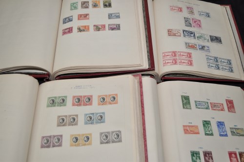 Lot 169 - Four volumes of The New Age Stamp Album...