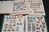 Lot 176 - A King George VI stamp album, part complete; a...