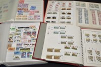Lot 205 - Four albums of QEII unmounted mint stamps,...