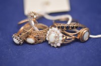 Lot 601 - Five 9ct. yellow gold rings, some set with...