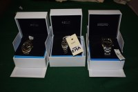 Lot 619A - Three Seiko automatic stainless steel...